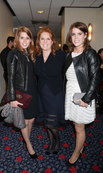 Sarah poses with her two daughters