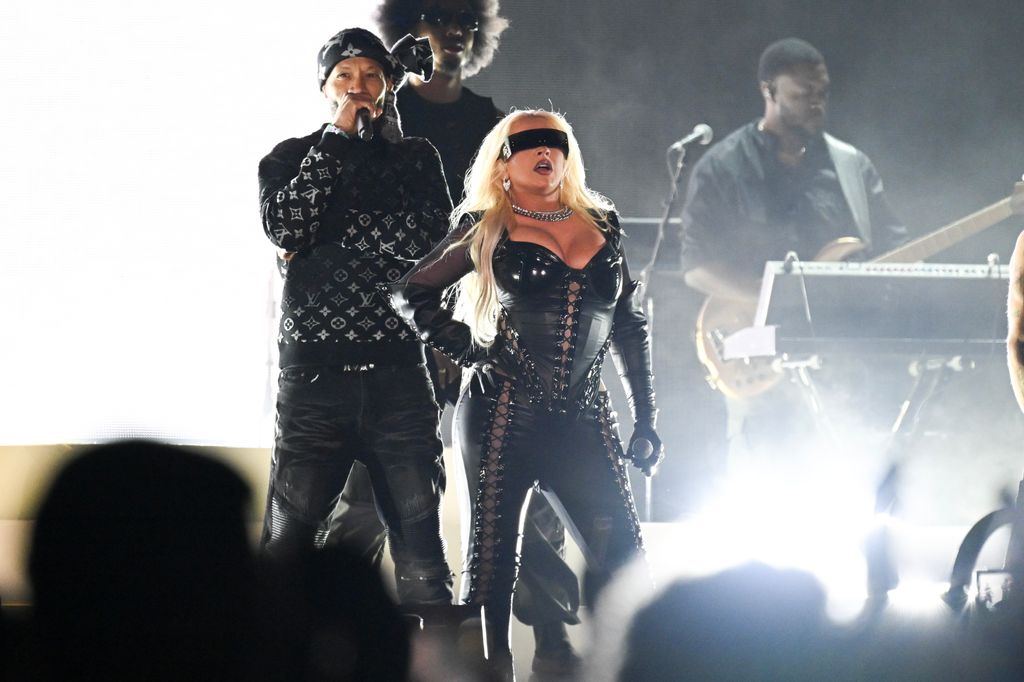 Redman joins Christina Aguilera for a rendition of "Dirrty" at Usher's Lovers & Friends Music Festival in Las Vegas