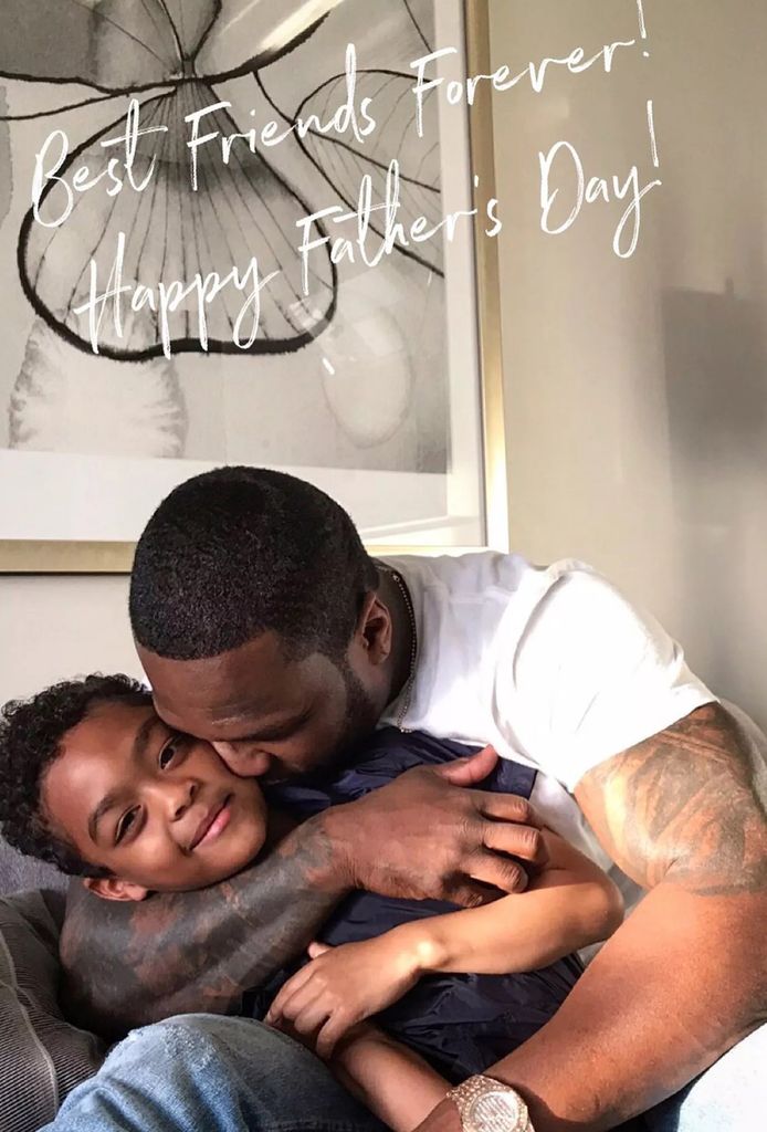 photo of 50 Cent hugging son Sire