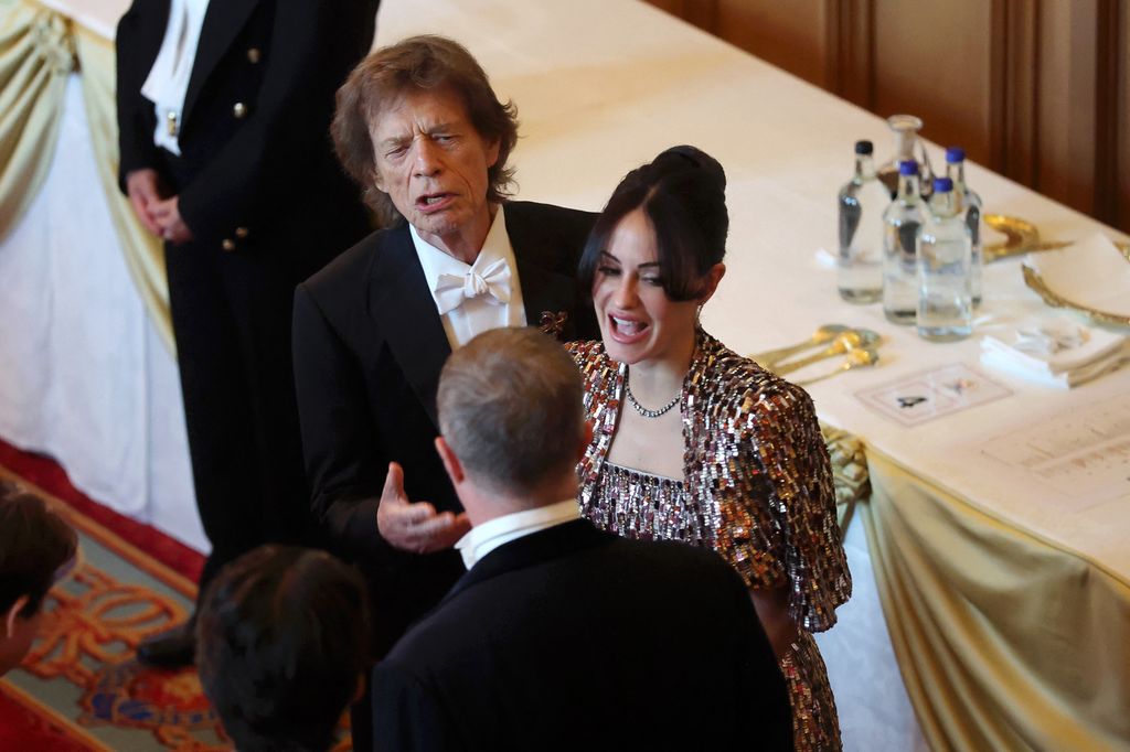 Mick Jagger of British rock band, The Rolling Stones and his partner Melanie Hamrick attend a State Banquet at Windsor Castle