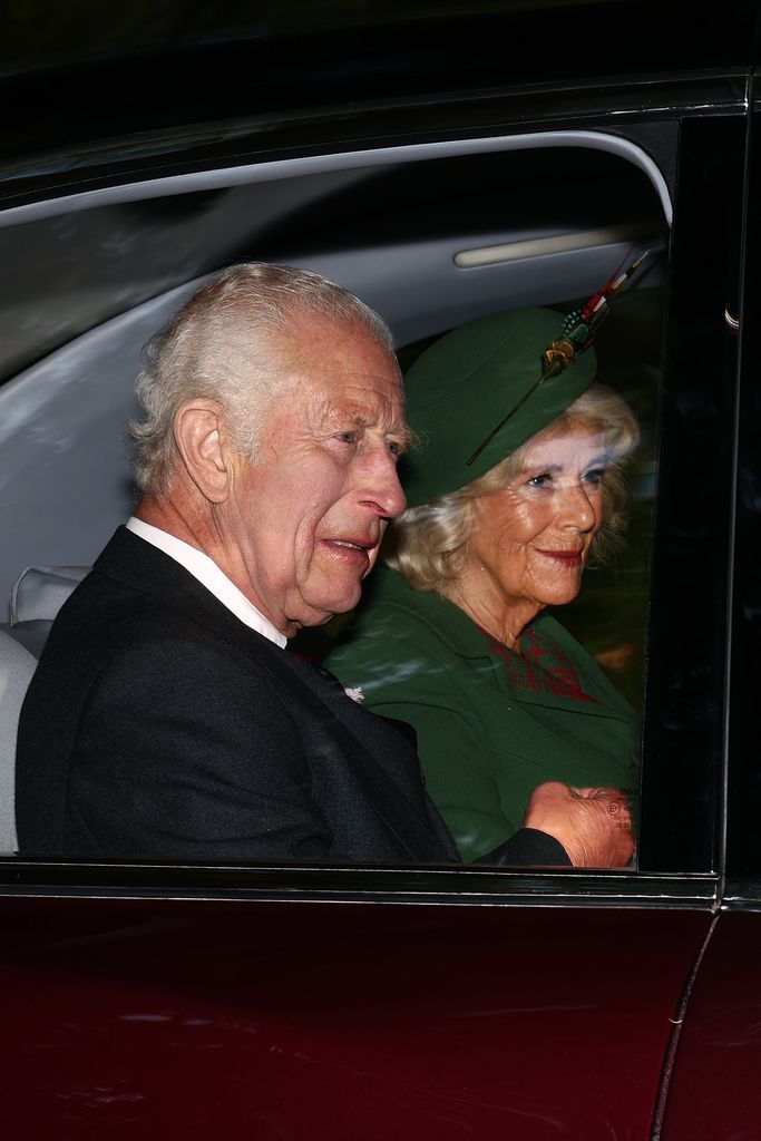 King Charles III and Queen Camilla arrive by car at Crathie Kirk to attend the church service