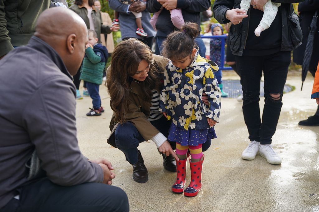 Kate admired three-year-old Maya Sanmuganathan's stripy tights