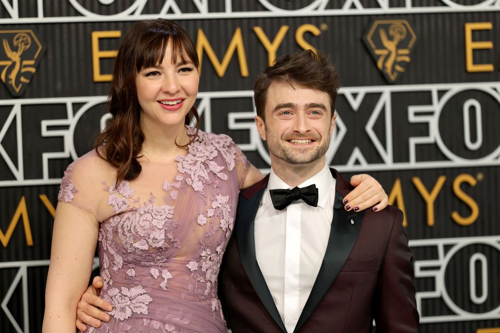 Erin Darke and Daniel Radcliffe attend the 75th Primetime Emmy Awards at Peacock Theater on January 15, 2024 in Los Angeles, California