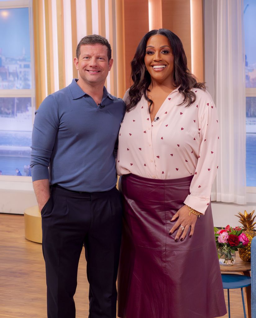 Alison Hammond wearing a heart print blouse with a red burgundy leather skirt