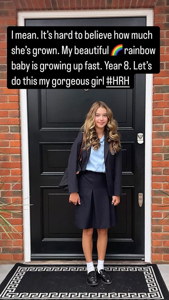 Amanda Holden's daughter Lexi posing in front of front door 