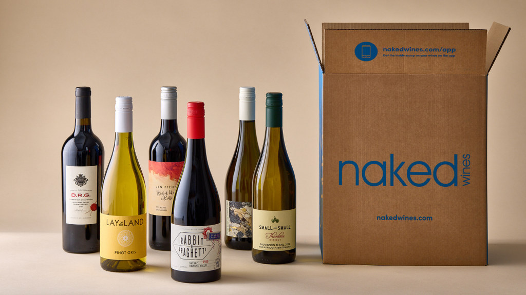 six bottles of wine next to naked wines box