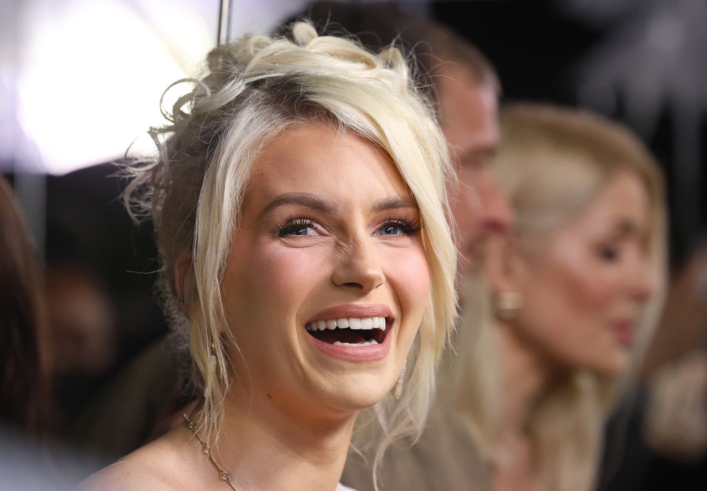 Lottie Moss smiling widely 