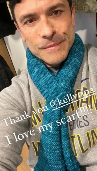 Mark Consuelos wearing a scarf knitted by Kelly Ripa