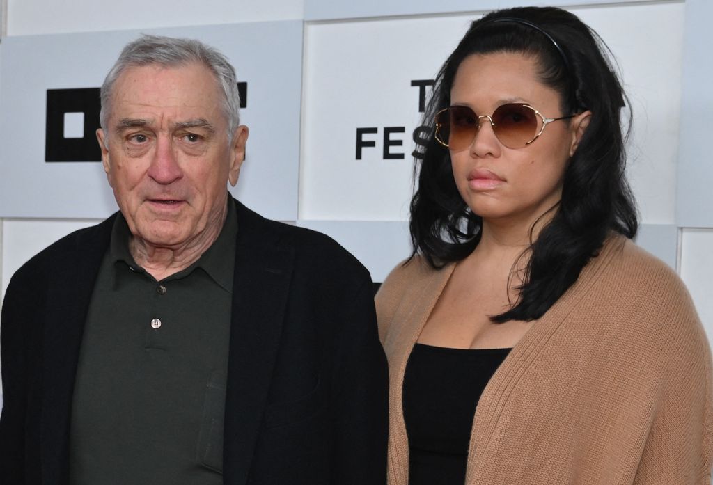 Robert De Niro and his girlfriend Tiffany Chen arrive to the screening of "Kiss the Future" during the opening night of the Tribeca Film Festival 