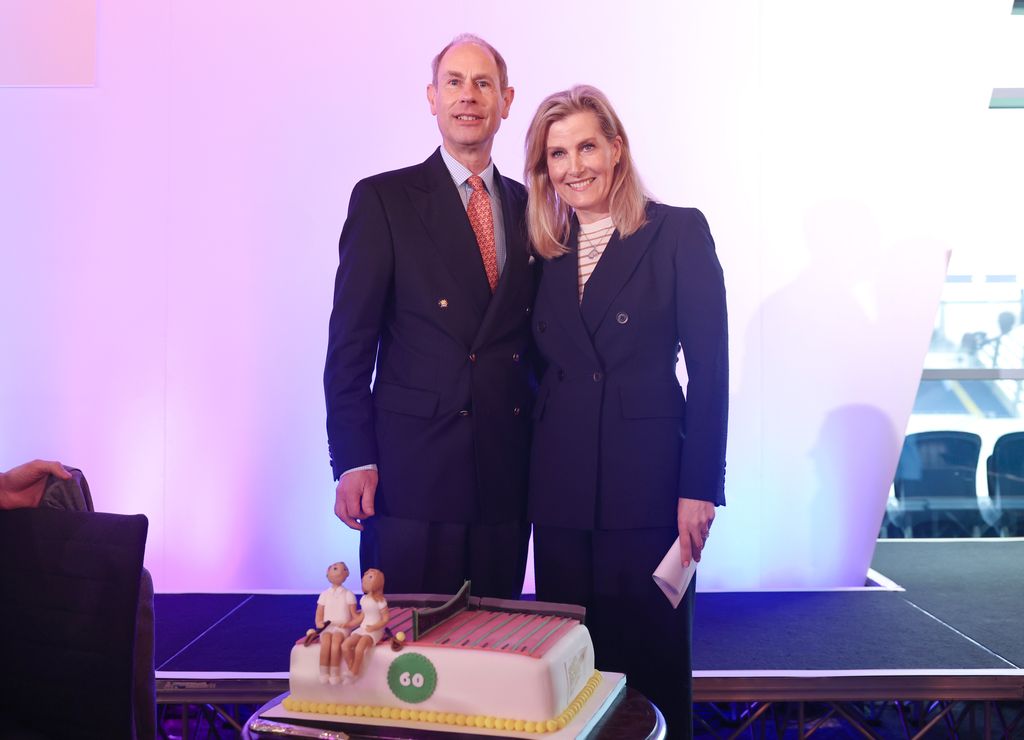 Prince Edward and Duchess Sophie in front of a cake