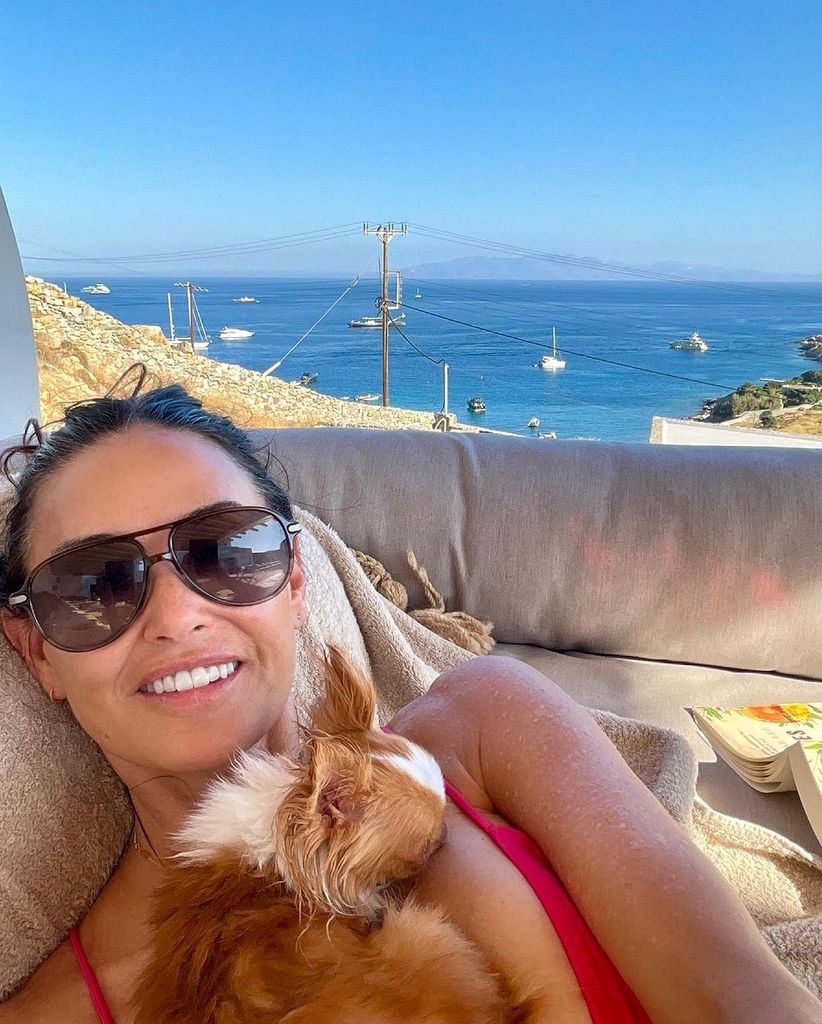 Demi Moore sunbathing with her dog