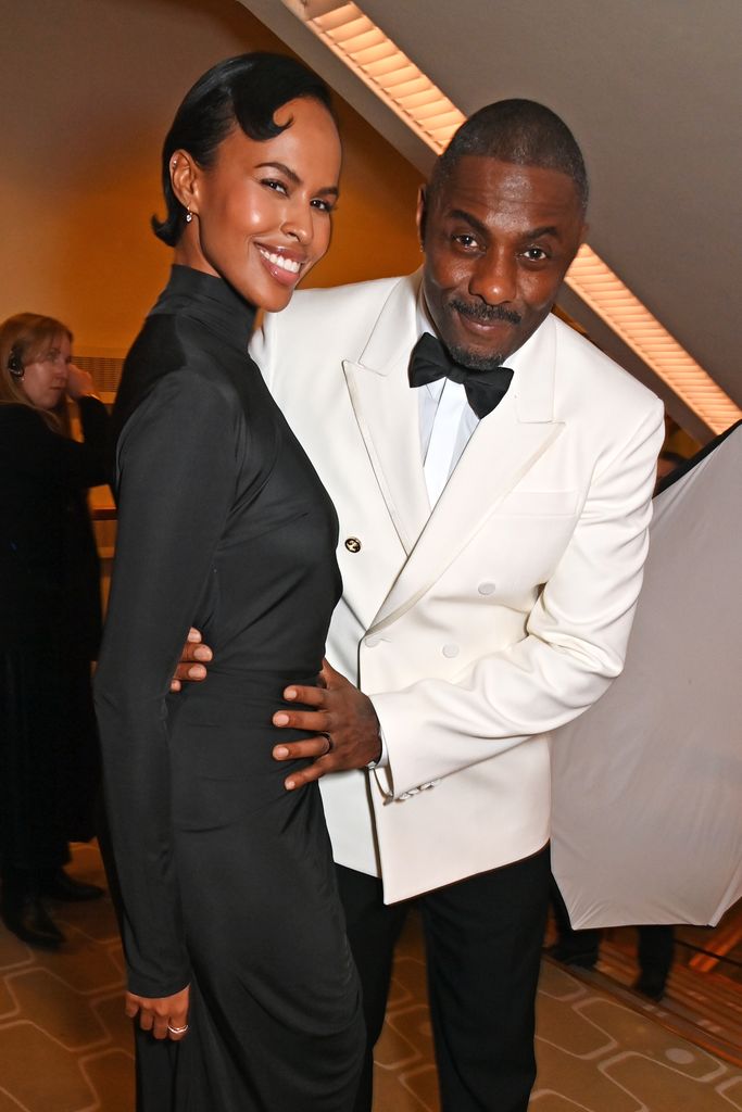 Sabrina Elba and Idris Elba pose backstage during the EE BAFTA Film Awards 2024 at The Royal Festival Hall on February 18, 2024 in London, England