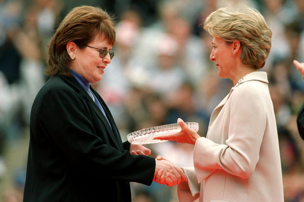 The Duchess of Gloucester (r) presents Billie Jean King (l) with the engraved plate during the Parade of Champions on centre court