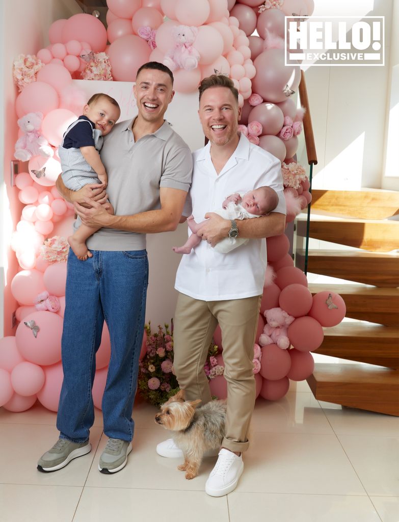 Stuart and Francis look delighted as they show off their newborn