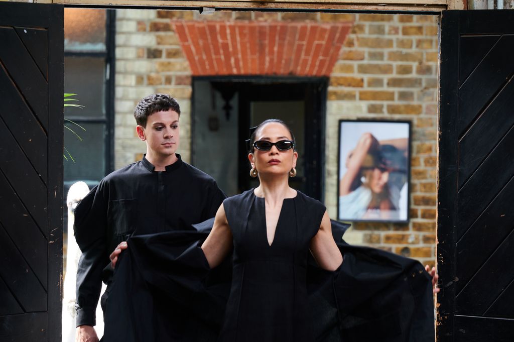woman wearing black in dark sunglasses 