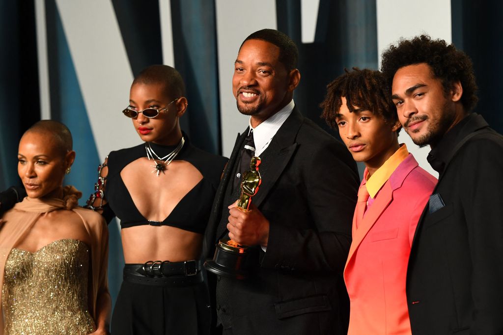 Will Smith, with his award for Best Actor in a Leading Role for "King Richard", poses with his sons Trey Smith and Jaden Smith, daughter Willow Smith and wife Jada Pinkett Smith, as they attend the 2022 Vanity Fair Oscar Party following the 94th Oscars at