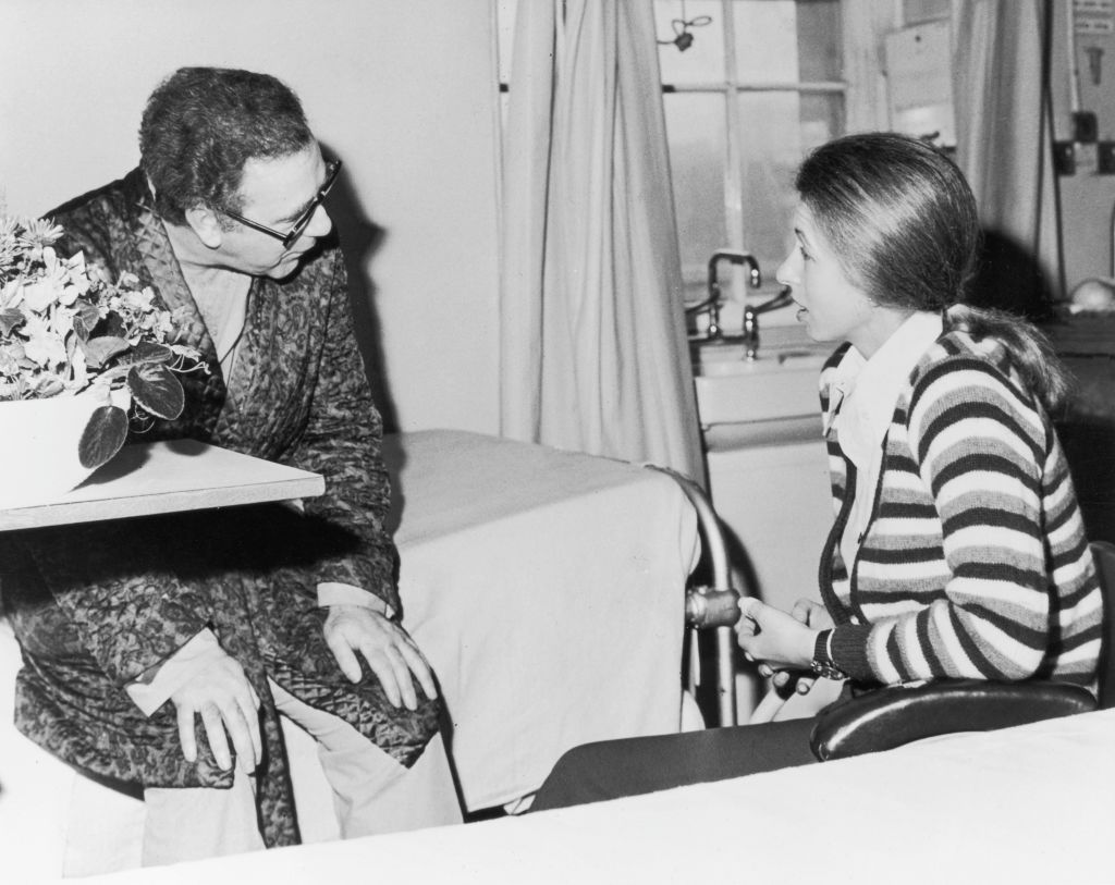 Princess Anne visiting journalist Brian McConnell at St George's Hospital in London after he was shot in the chest while attempting to intervene during the attempt to kidnap the Princess in the Mall, 25th March 1974. (Photo by Fox Photos/Hulton Archive/Getty Images)