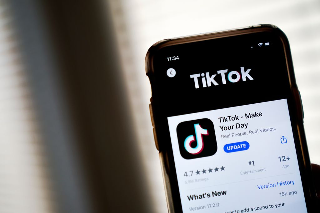 In this photo illustration, the download page for the TikTok app is displayed on an Apple iPhone on August 7, 2020 in Washington, DC. 