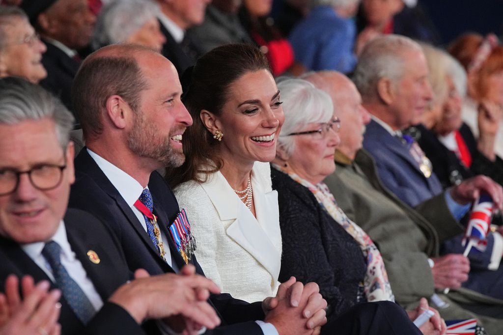 William and Kate laughing in their seats at VE Day concert