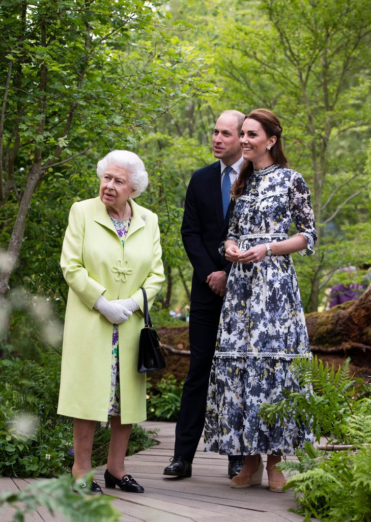 Kate showing the late Queen Elizabeth II around her Back to Nature garden in 2019