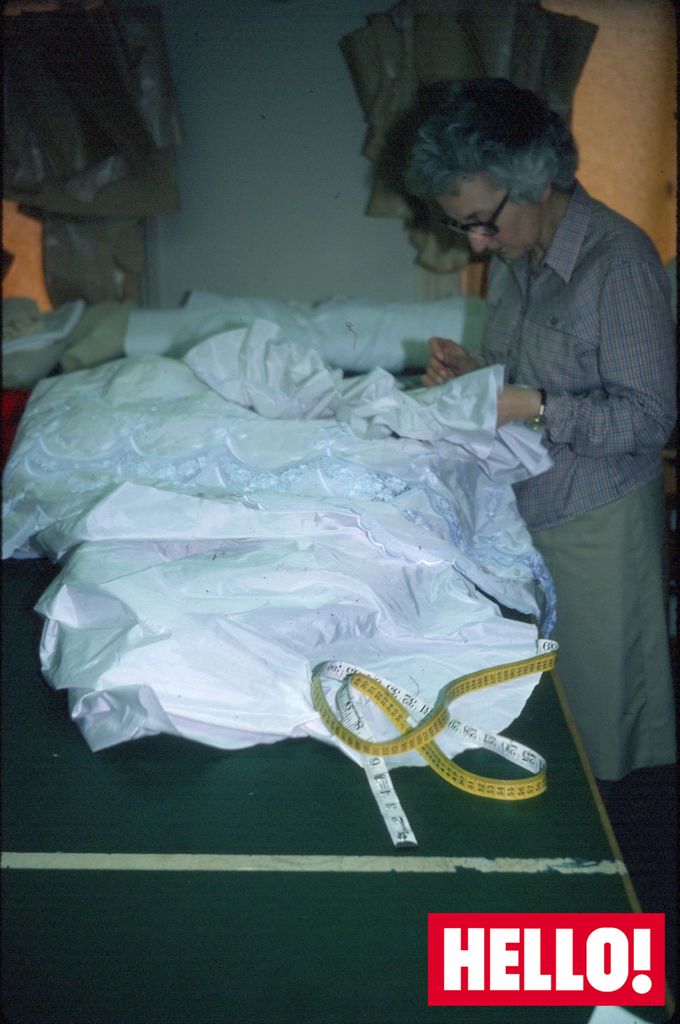 Princess Diana's spare wedding dress being stitched by designers