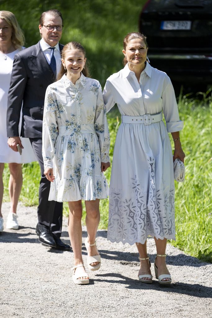 Crown Princess Victoria and Princess Estelle walking in garden