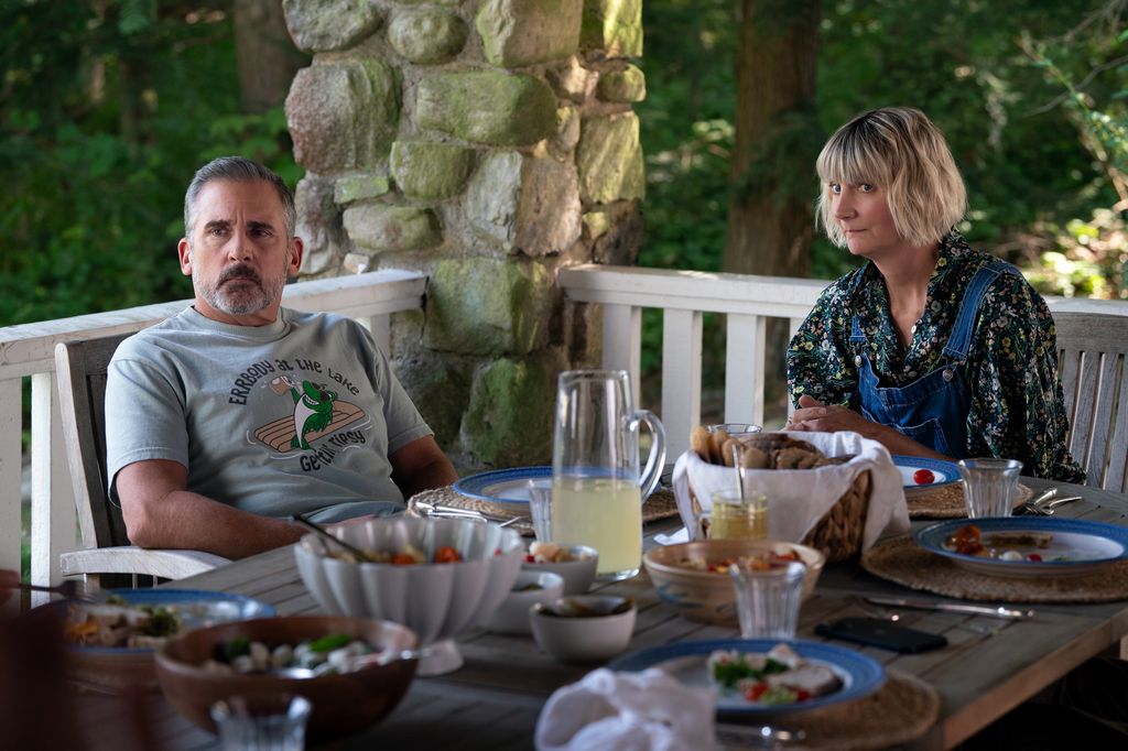man and woman sitting at outdoor breakfast table
