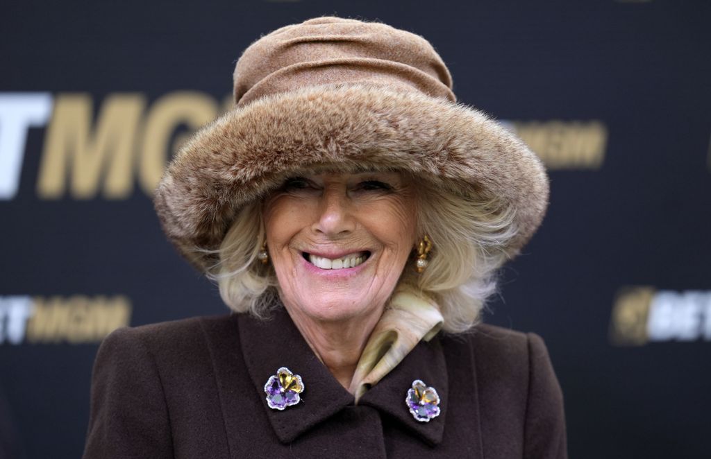 Queen Camilla before presenting the trophies for the winners of the BetMGM Queen Mother Champion Chase on day two of the 2025 Cheltenham Festival at Cheltenham Racecourse.