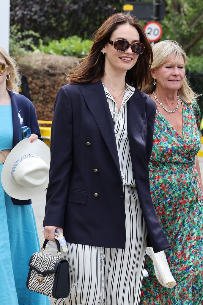Lily James attends day fourteen of the Wimbledon Tennis Championships