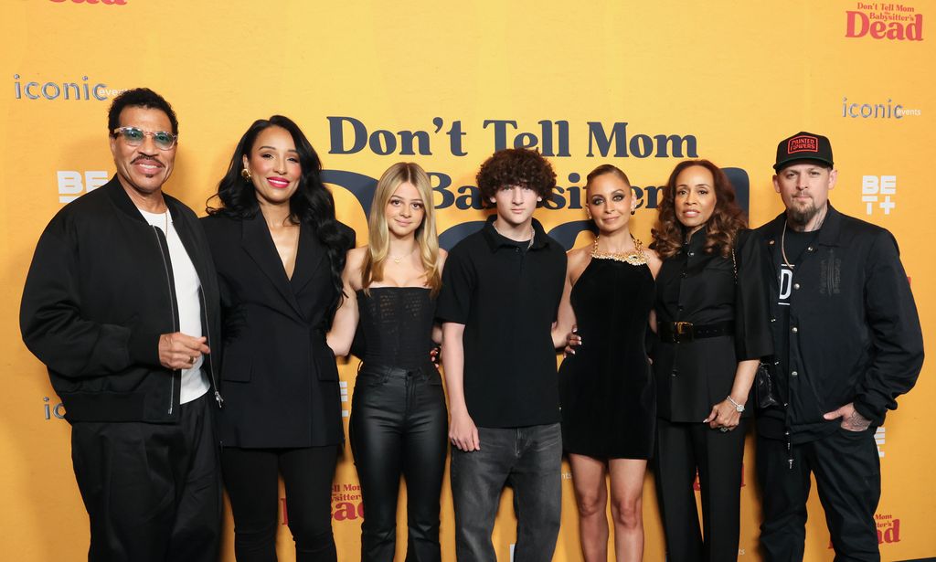 A photo of the Lionel Richie and his family at the Don't Tell Mom the Babysitter's Dead premiere