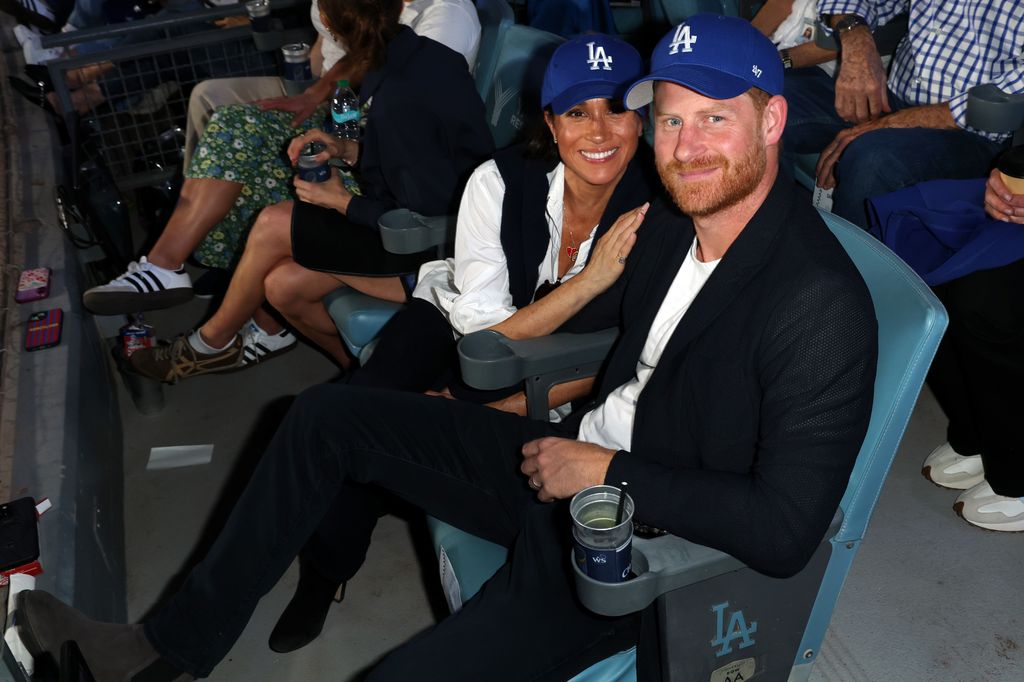 Meghan and Harry wore matching Los Angeles Dodgers hats at the game on October 28