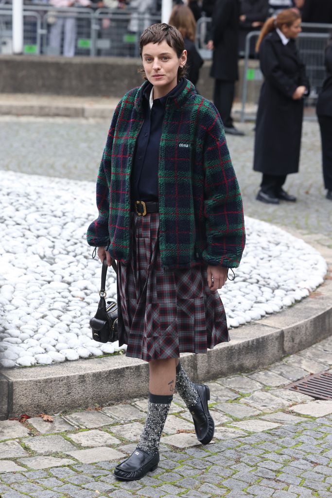 Emma Corrin attends Miu Miu fashion show during the Womenswear Spring Summer 2026 as part of Paris Fashion Week on October 6, 2025 in Paris, France