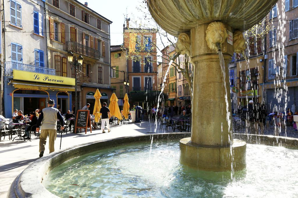 View of street with fountain in Provence