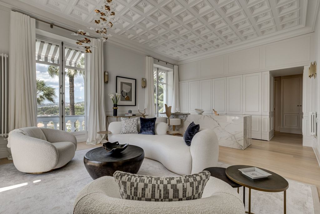 Consider curved furniture like this incredible set up by interior designer Juliette Byrne