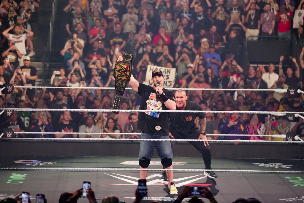 Randy Orton (R) watches John Cena in the ring during Monday Night Raw at T-Mobile Arena on April 21, 2025 in Las Vegas, Nevada