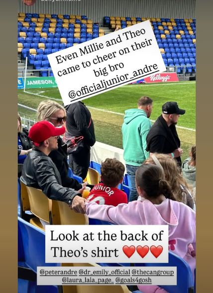 Peter Andre and Emily Andre with two of their children at a football match