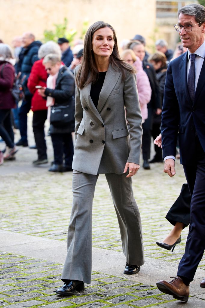 The Spanish royal exuded sophisticated style in a tailored suit