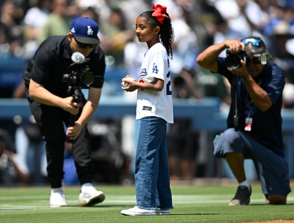 Bianca Bryant prepares to throw out the first pitch 