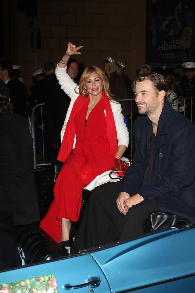 Olivia d'Abo outside The Hollywood Christmas Parade in Hollywood on November 30, 2025 in Los Angeles, California. (Photo by MEGA/GC Images)