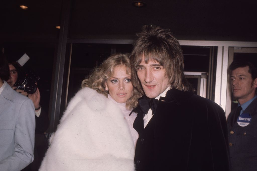 Britt Ekland in a fur coat with Rod Stewart