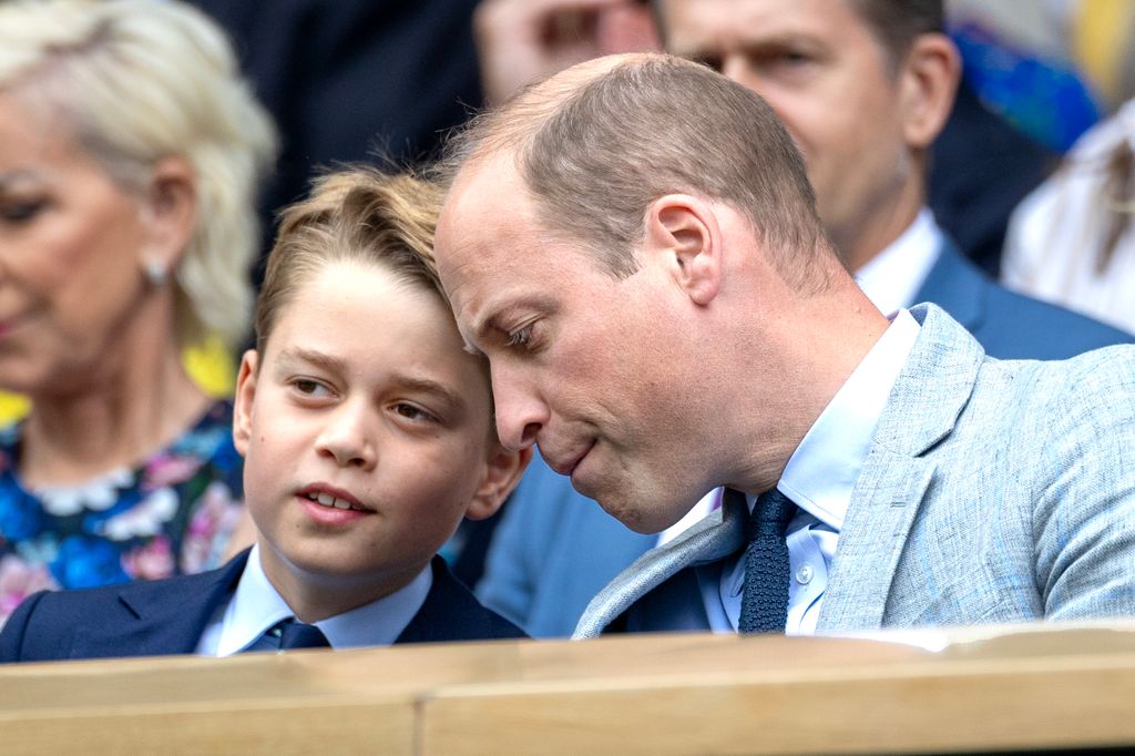 Prince George speaking to Prince William at Wimbledon 2023