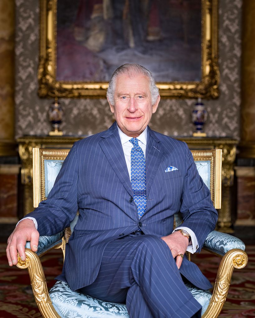 The King is seated in a chair which dates back to 1829