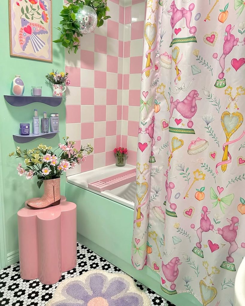 bathroom with green bath and pink tiles 