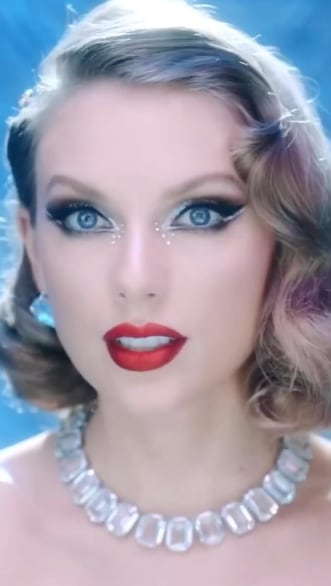 taylor swift photo wearing pat mcgrath red lipstick in bejeweled video