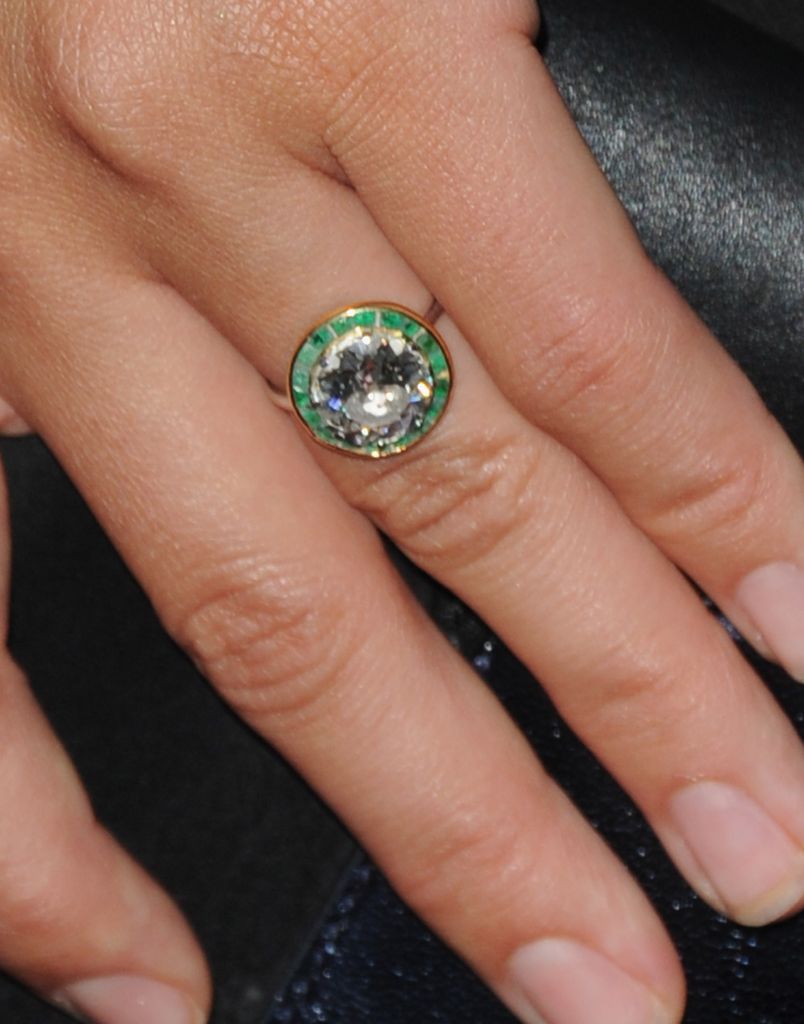 Olivia Wilde models emerald and diamond engagement ring