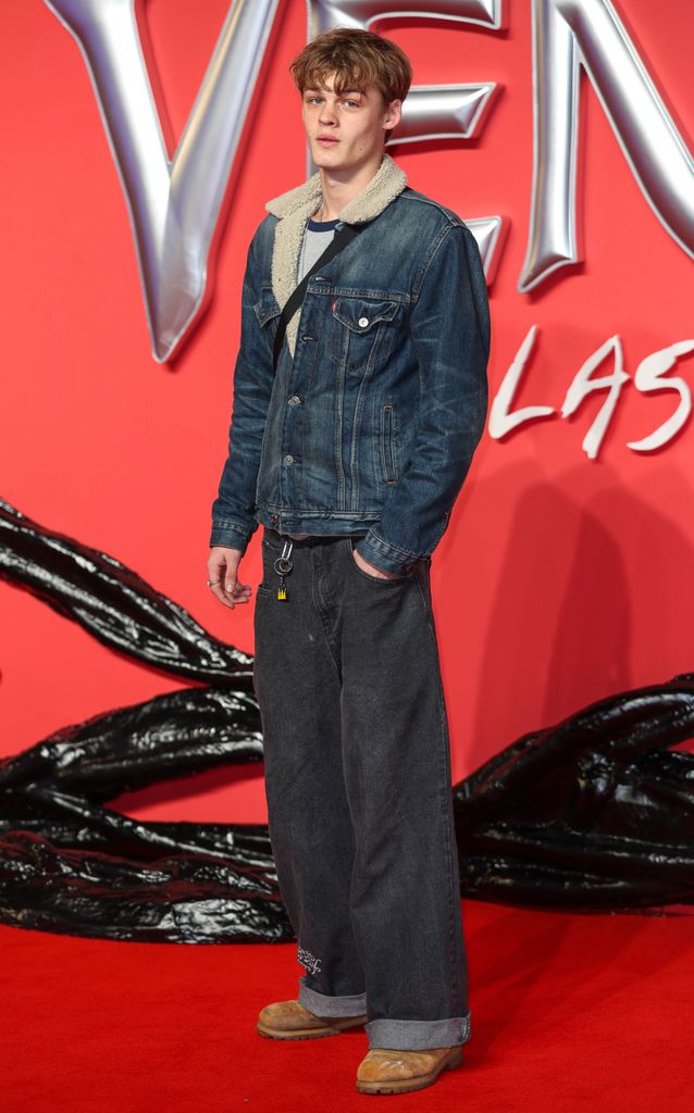 Tom Hardy's son, Louis, in a denim jacket and black jeans