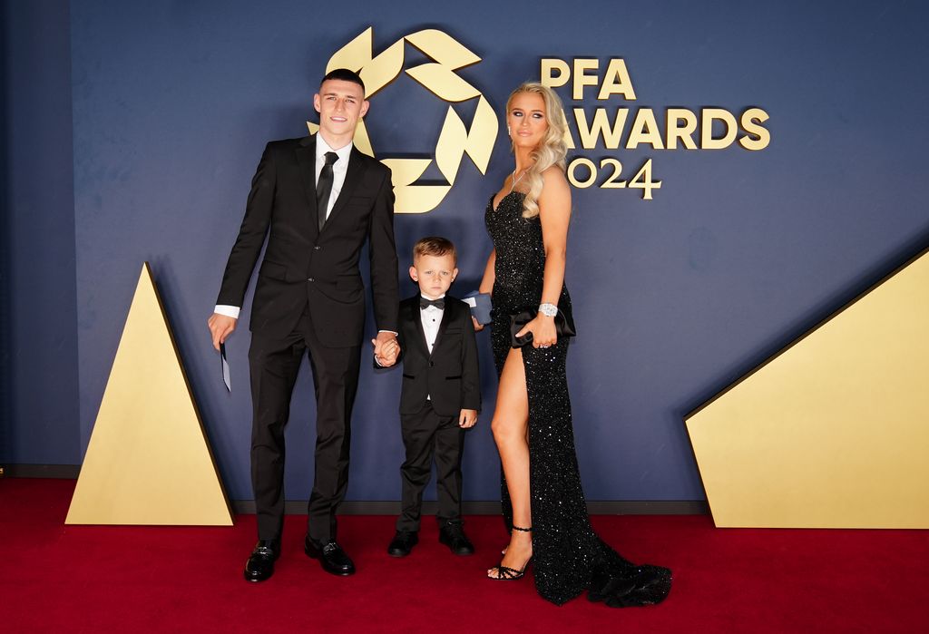 family of three on red carpet