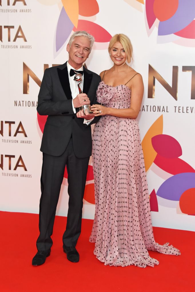 Phillip Schofield (L) and Holly Willoughby, accepting the award for Best Daytime for "This Morning"