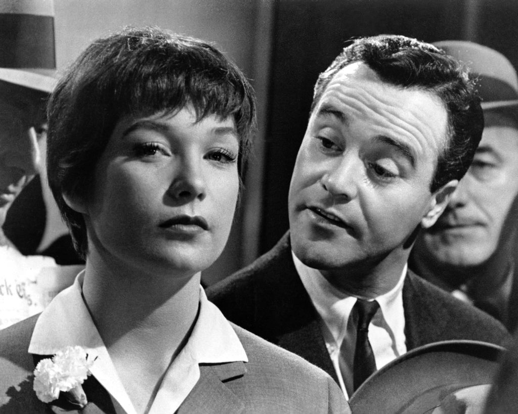American actress Shirley MacLaine as Fran Kubelik and Jack Lemmon (1925 - 2001) as C.C. 'Bud' Baxter in a scene from 'The Apartment', directed by Billy Wilder, 1960.