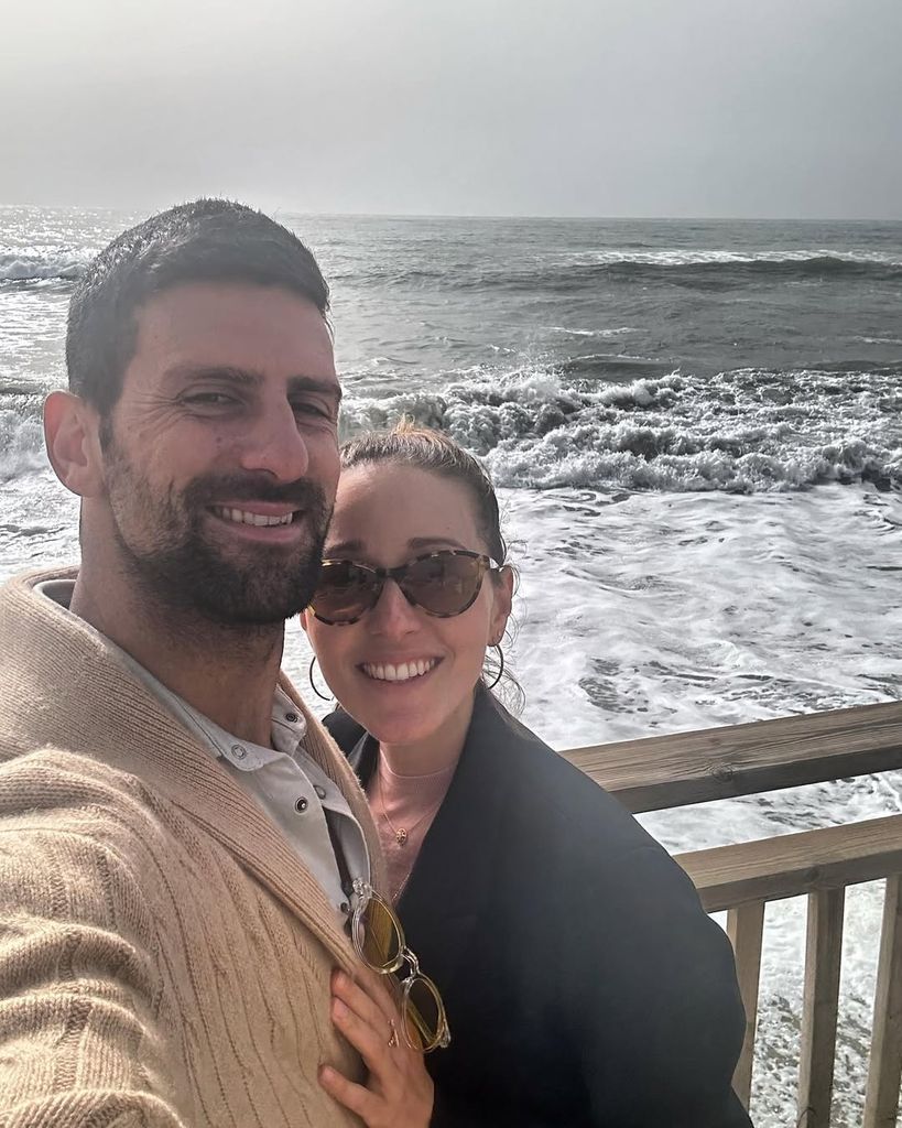 Novak Djokovic and Jelena take a selfie in front of the ocean